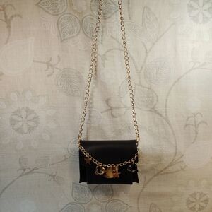 Stylish Black Mini Bag with Gold Accents